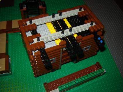Gallaghersart dsc03325sm from LEGO Log Cabin version 5 gallaghersart_dsc03325sm.jpg - The underside support system for the LEGO log cabin walls