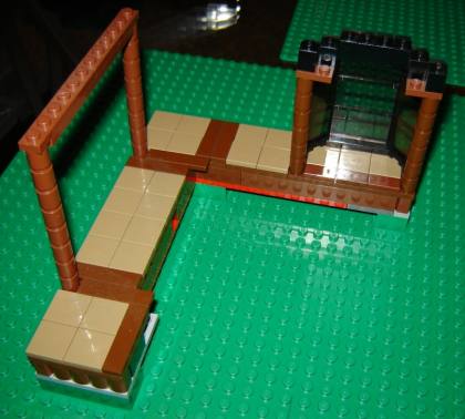 LEGO log cabin wrap around Deck from LEGO Log Cabin version 5 DSC03324sm.jpg - The LEGO log cabin wrap around Deck