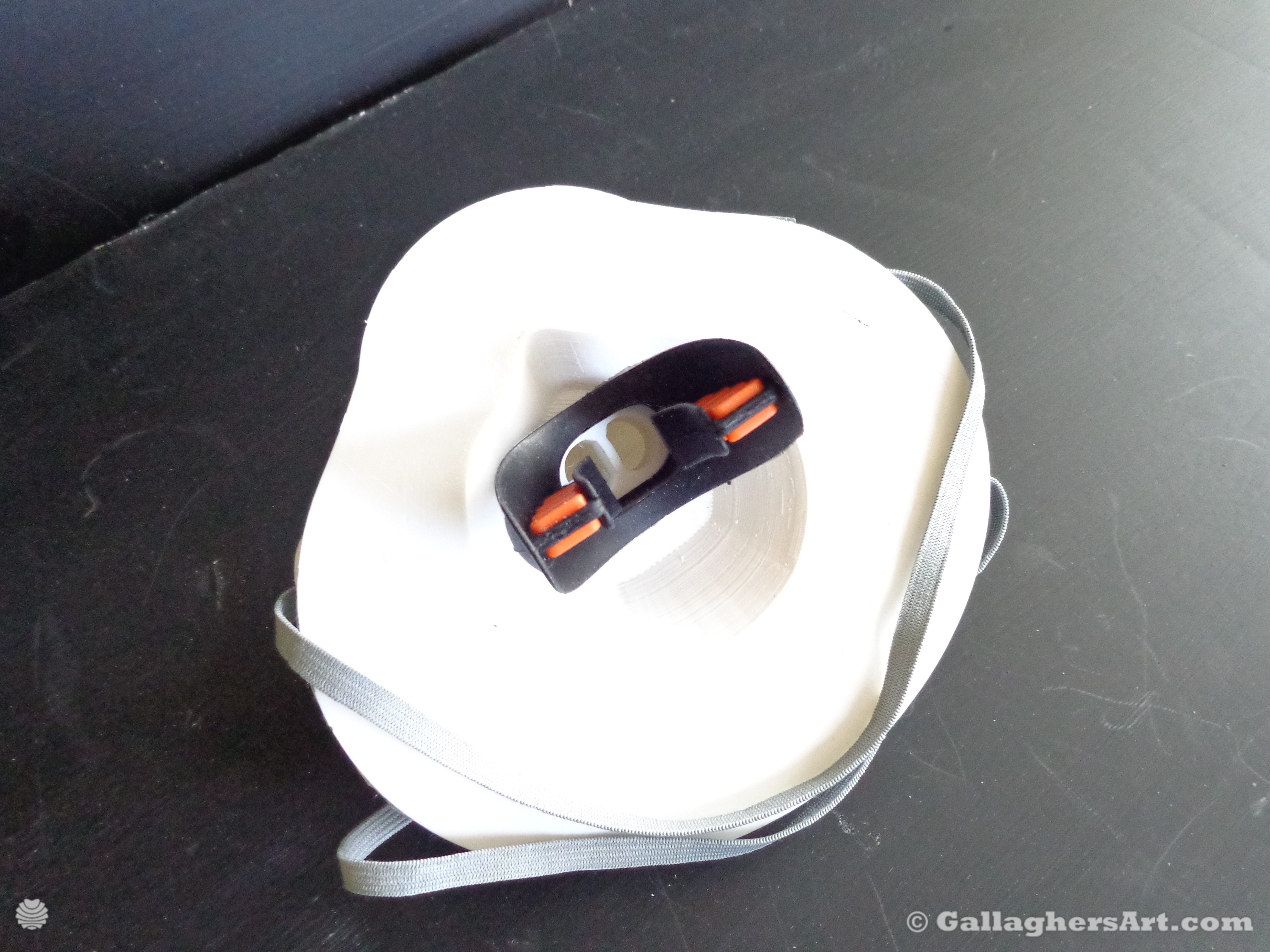 Gallaghersart airtight mask 003 dsc00349sm from Airtight adapters for Medical Masks and Face Respirators  - Install scuba mouthpiece and test unit. Fix any leaks.
Verify tape is holding while using and no leaks appear. ANY leakage will void the desired protection.
